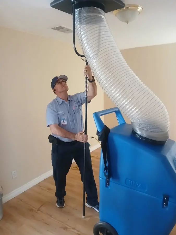 Mini Split Installation technician using HEPA equipment in Gulf Shores